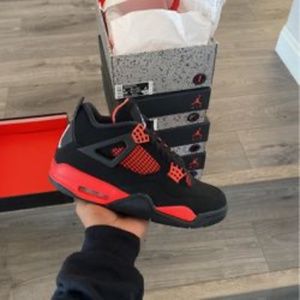 Red Thunder Jordan 4s